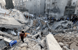 Palestinians search the destroyed annex of the Church of St. Porphyrius in Gaza City after an airstrike on Oct. 20, 2023